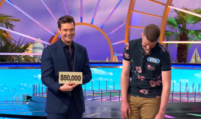Show hostess Vanna White in a 'Wheel of Fortune' episode, Photo Credit: Wheel Of Fortune/Youtube