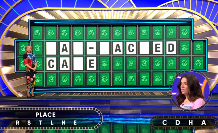 Show hostess Vanna White in a 'Wheel of Fortune' episode, Photo Credit: Wheel of Fortune/Youtube