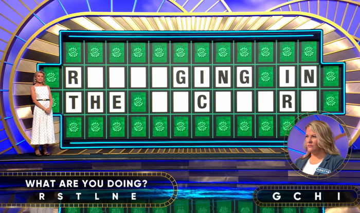 Show hostess Vanna White in a 'Wheel of Fortune' episode, Photo Credit: Wheel Of Fortune/Youtube