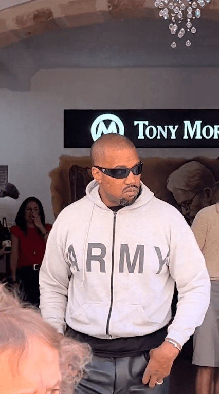 Kanye West steps outside of Tony Mora in Mallorca, Spain, Photo Credit: Kurrco/X
