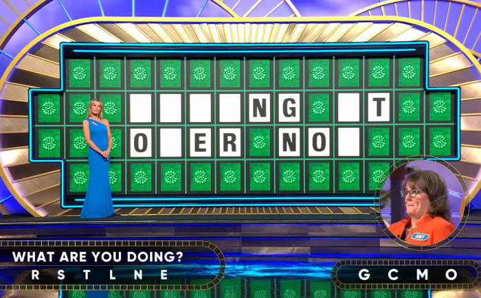 Show hostess Vanna White in a 'Wheel of Fortune' episode, Photo Credit: Wheel of Fortune/Youtube