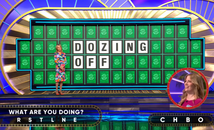 Show hostess Vanna White in a 'Wheel of Fortune' episode, Photo Credit: Wheel of Fortune/Youtube