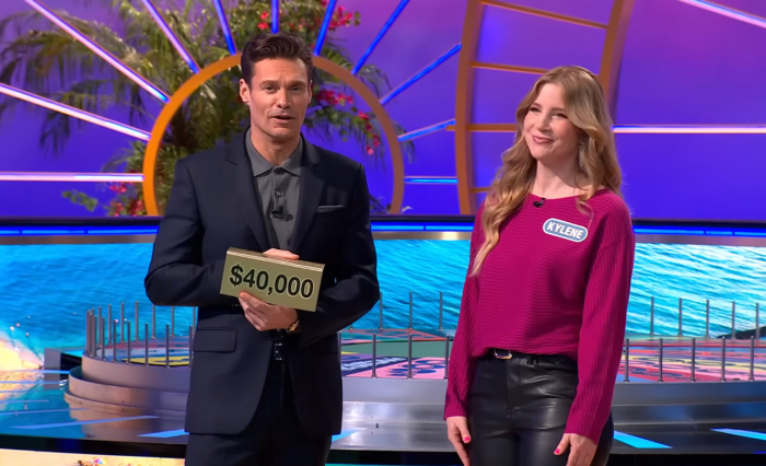 Show host Ryan Seacrest and contestant Kylene Foster in a 'Wheel of Fortune' episode, Photo Credit: Wheel of Fortune/Youtube