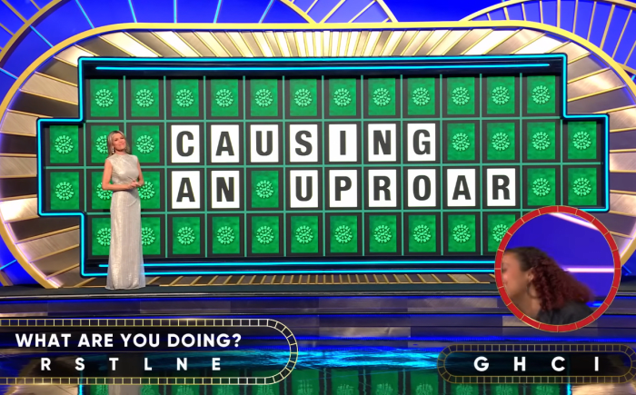 Show hostess Vanna White in a 'Wheel of Fortune' episode, Photo Credit: Wheel of Fortune/Youtube