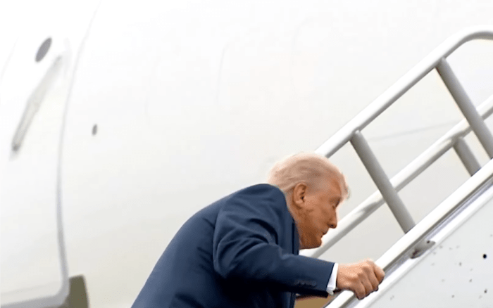 President Donald Trump stumbles while going up stairs to Air Force One, Photo Credit: The Economic Times/Youtube