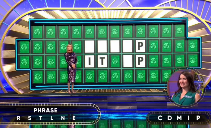 Show hostess Vanna White in a 'Wheel of Fortune' episode, Photo Credit: Wheel of Fortune/Youtube