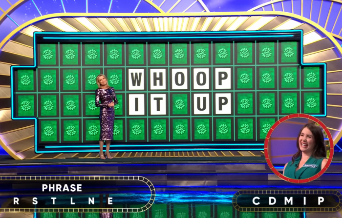 Show hostess Vanna White in a 'Wheel of Fortune' episode, Photo Credit: Wheel of Fortune/Youtube