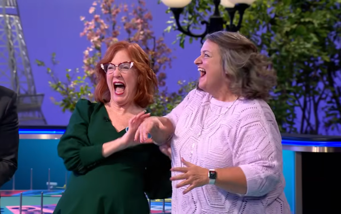 Contestant Linda Keyes celebrating with her friend in a 'Wheel of Fortune' episode, Photo Credit: Wheel of Fortune/Youtube
