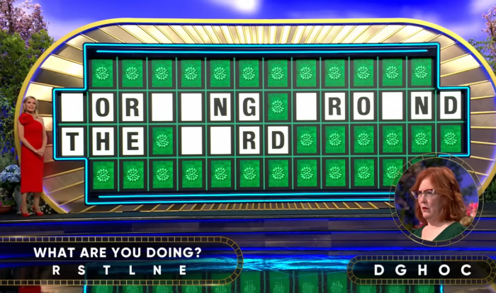 Show hostess Vanna White in a 'Wheel of Fortune' episode, Photo Credit: Wheel of Fortune/Youtube