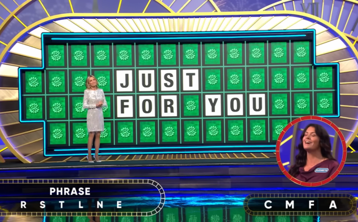 Show hostess Vanna White in a 'Wheel of Fortune' episode, Photo Credit: Wheel of Fortune/Youtube