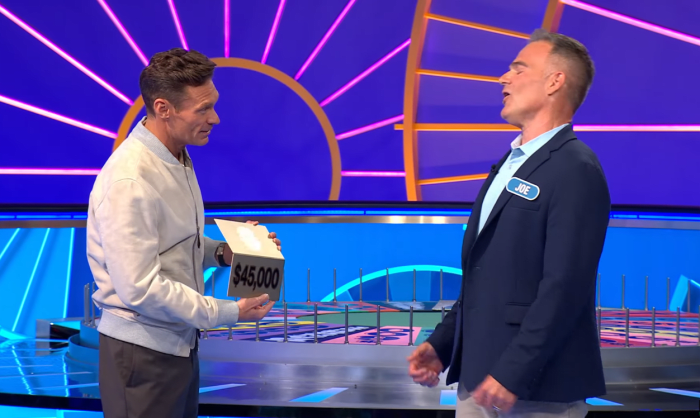 Show host Ryan Seacrest and contestant Joe Ferroni in a 'Wheel of Fortune' episode, Photo Credit: Wheel of Fortune/Youtube