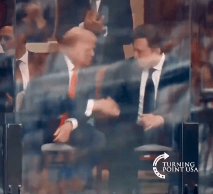 President Donald Trump and Elon Musk sitting together at Charlie Kirk's Memorial, Photo Credit: TRUMP ARMY_/X