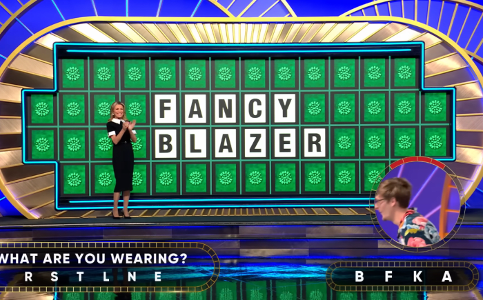 Show hostess Vanna White in a 'Wheel of Fortune' episode, Photo Credit: Wheel of Fortune/Youtube