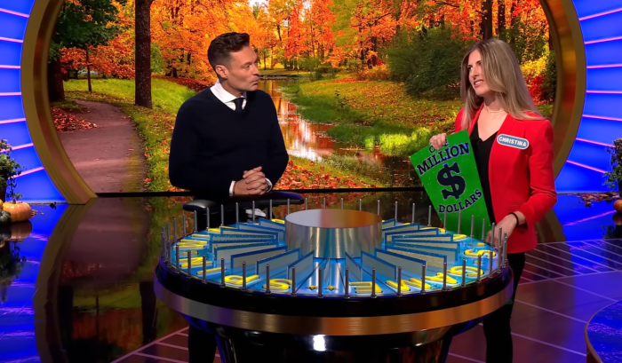 Show host Ryan Seacrest and contestant Christina Derevjanik in a 'Wheel of Fortune' episode, Photo Credit: Wheel of Fortune