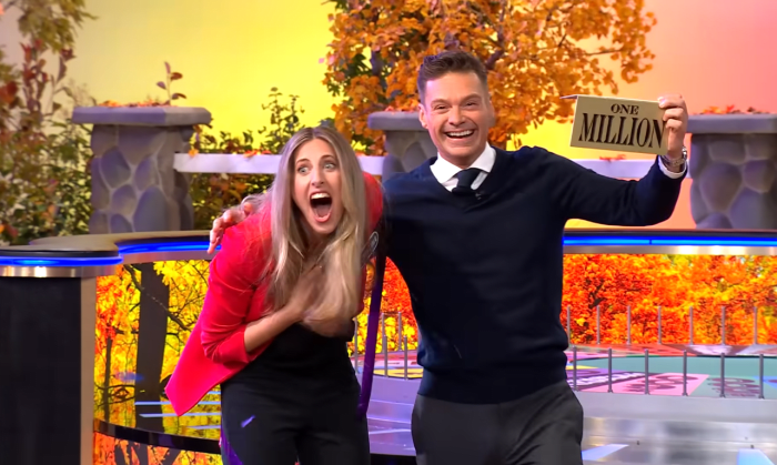 Show host Ryan Seacrest and contestant Christina Derevjanik in a 'Wheel of Fortune' episode, Photo Credit: Wheel of Fortune