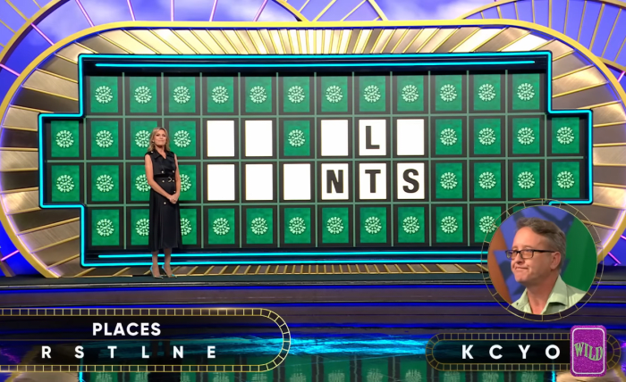 Show hostess Vanna White in a 'Wheel of Fortune' episode, Photo Credit: Wheel of Fortune/Youtube