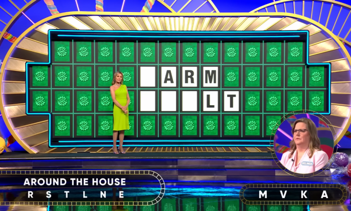 Show hostess Vanna White in a 'Wheel of Fortune' episode, Photo Credit: Wheel of Fortune/Youtube