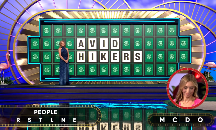Show hostess Vanna White in a 'Wheel of Fortune' episode, Photo Credit: Wheel of Fortune/Youtube
