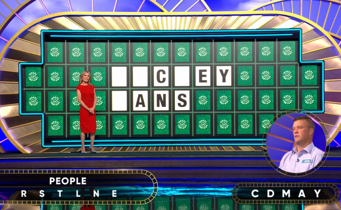 Show hostess Vanna White in a 'Wheel of Fortune' episode, Photo Credit: Wheel of Fortune/Youtube