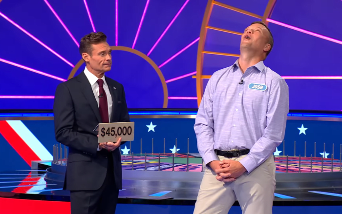 Show host Ryan Seacrest and contestant Josh Post in a 'Wheel of Fortune' episode, Photo Credit: Wheel of Fortune/Youtube