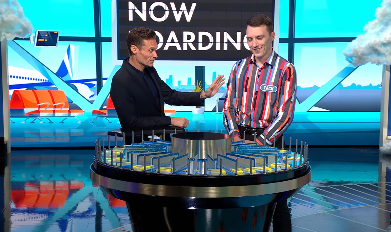 Show host Ryan Seacrest and contestant Zack Miller in a 'Wheel of Fortune' episode, Photo Credit: Wheel of Fortune/Youtube