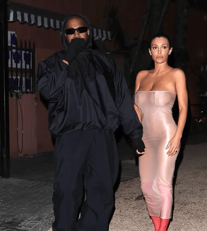 Bianca Censori posing with her husband Kanye West in a revealing dress, Photo Credit: Page Six/Youtube