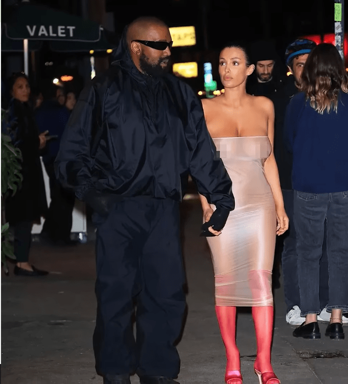 Bianca Censori walking with her husband Kanye West in a revealing dress, Photo Credit: Page Six/Youtube