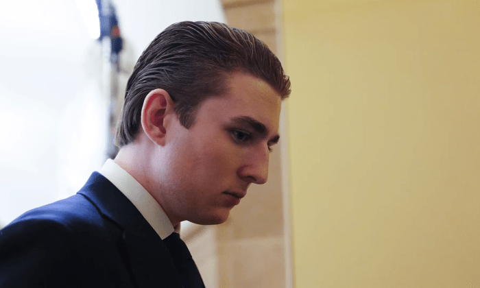 Barron Trump looking away from the camera, Photo Credit: Nicki Swift/Youtube