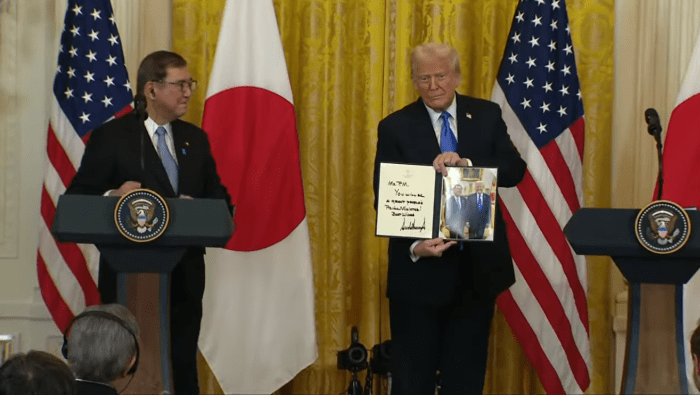 US President Donald Trump holding a photo standing with Japan PM Shigeru Ishiba, Photo Credit: Fox News/Youtube