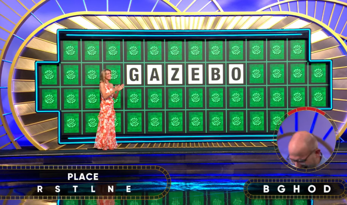 Show hostess Vanna White in a 'Wheel of Fortune' episode, Photo Credit: Wheel Of Fortune/Youtube