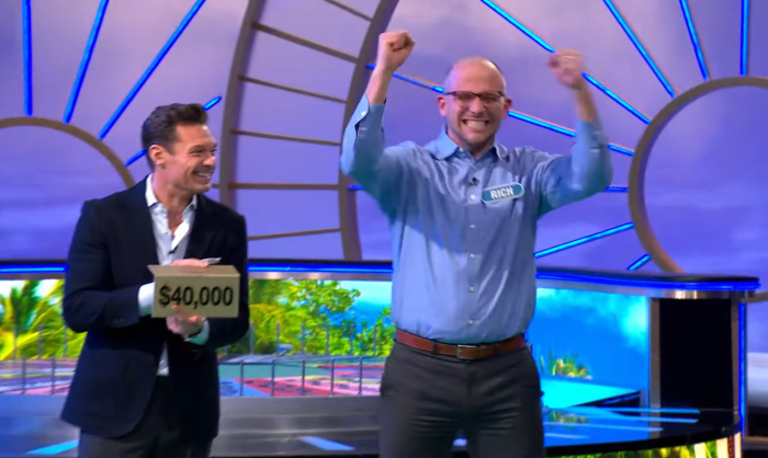 Ryan Seacrest and Rich Rinaldi with his family in a 'Wheel of Fortune' episode, Photo Credit: Wheel Of Fortune/Youtube