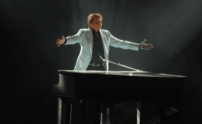 Barry Manilow performing on stage, Photo Credit: Access Hollywood/Youtube