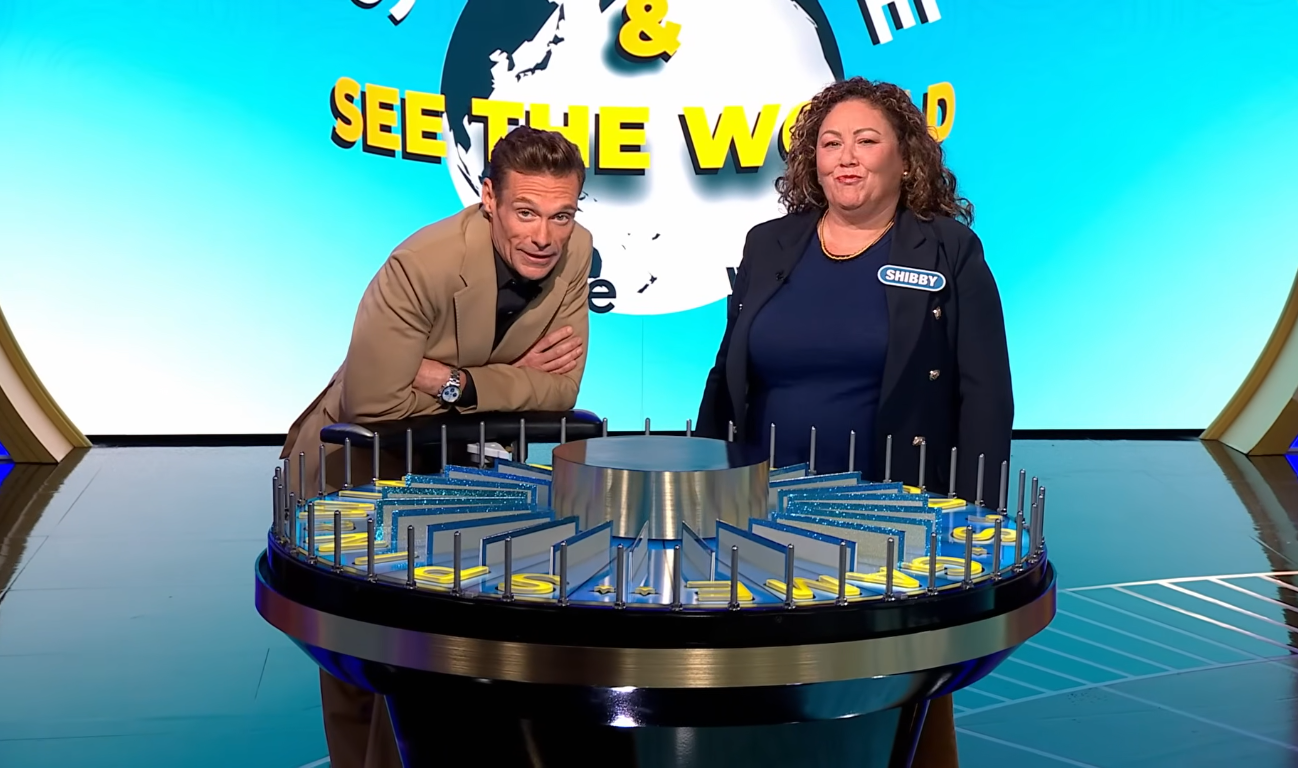 Show host Ryan Seacrest and contestant Shibby in a 'Wheel of Fortune' episode, Photo Credit: Wheel Of Fortune/Youtube