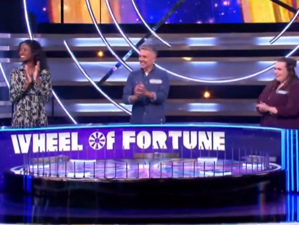 Wheel of Fortune UK players Yemi, Richard and Aimee at the show's studio, Photo Credit: Wheel of Fortune UK/X