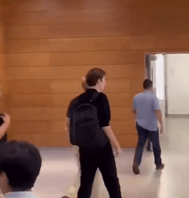 Barron Trump seen wearing his black backpack inside NYU, Photo Credit: johnny maga/X