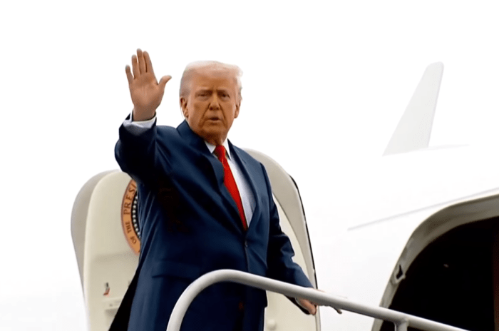 President Donald Trump waiving at the press before going inside Air Force One, Photo Credit: The Economic Times/Youtube