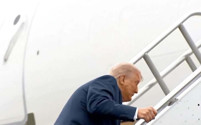 President Donald Trump stumbles while going up stairs to Air Force One, Photo Credit: The Economic Times/Youtube