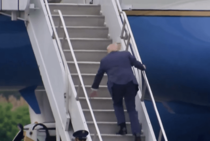 President Donald Trump stumbles while going up stairs to Air Force One, Photo Credit: The Economic Times/Youtube