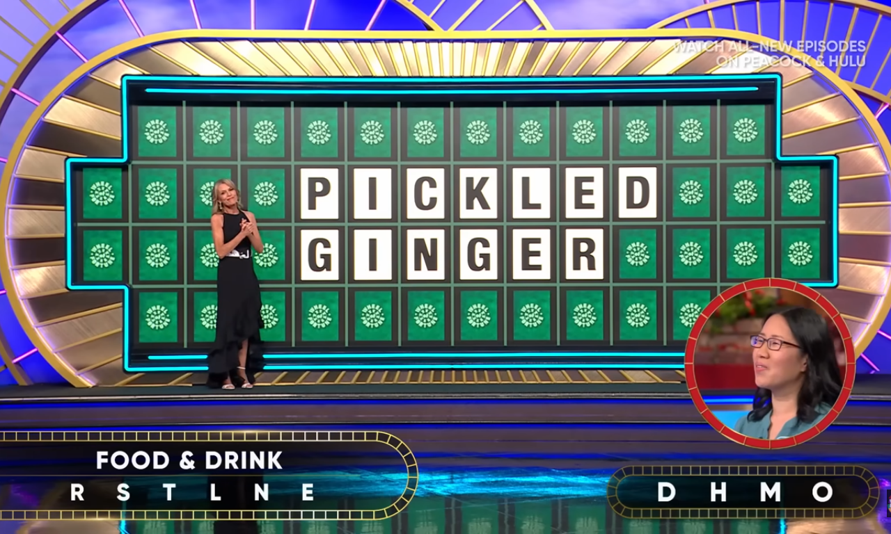 Show hostess Vanna White in a 'Wheel of Fortune' episode, Photo Credit: Wheel of Fortune/Youtube