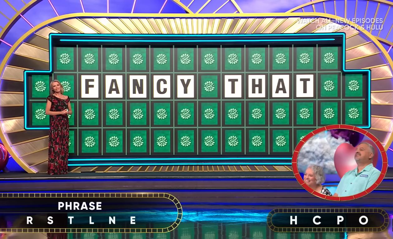 Show hostess Vanna White in a 'Wheel of Fortune' episode, Photo Credit: Wheel of Fortune/Youtube