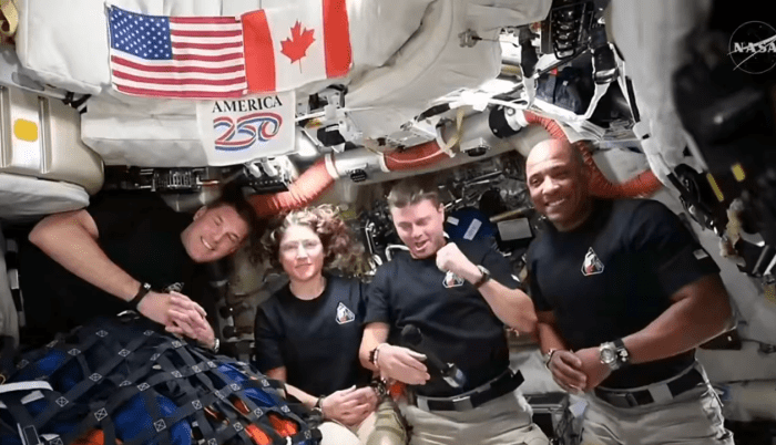 Artemis II crew inside the Orion spacecraft talking with President Donald Trump, Photo Credit: Michael Vincent/X