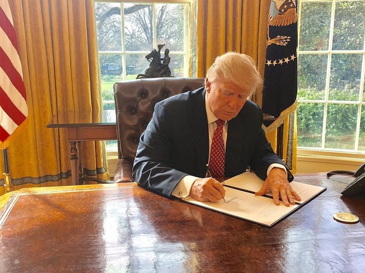 trumps red button on desk trumps red button on desk