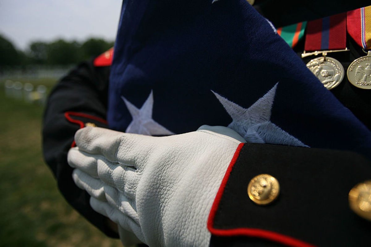 Photo Credit: Kristen Collins/Facebook, Gunnery Sgt. Mark Oliva via Wikimedia Commons