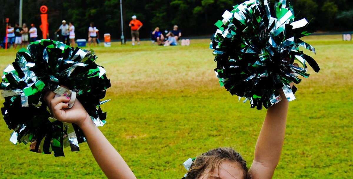 Cheerleading Team Forced Girl To Do Painful Splits (Video) Promo Image