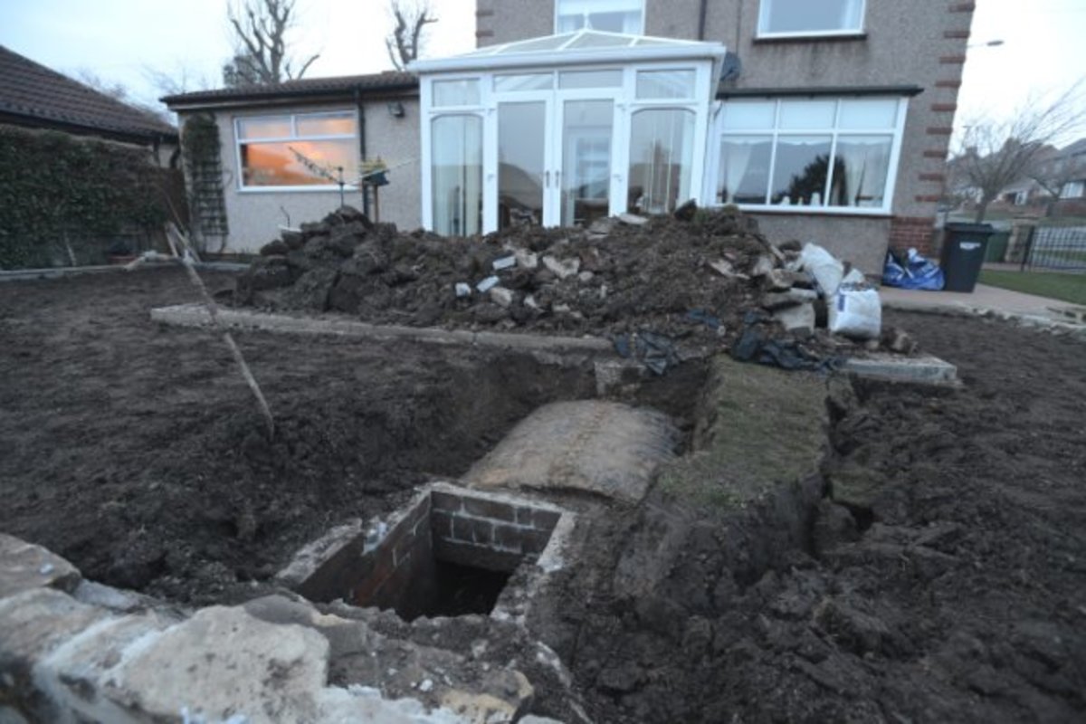 Man Discovers WWII Bomb Shelter Underneath His Lawn - Opposing Views