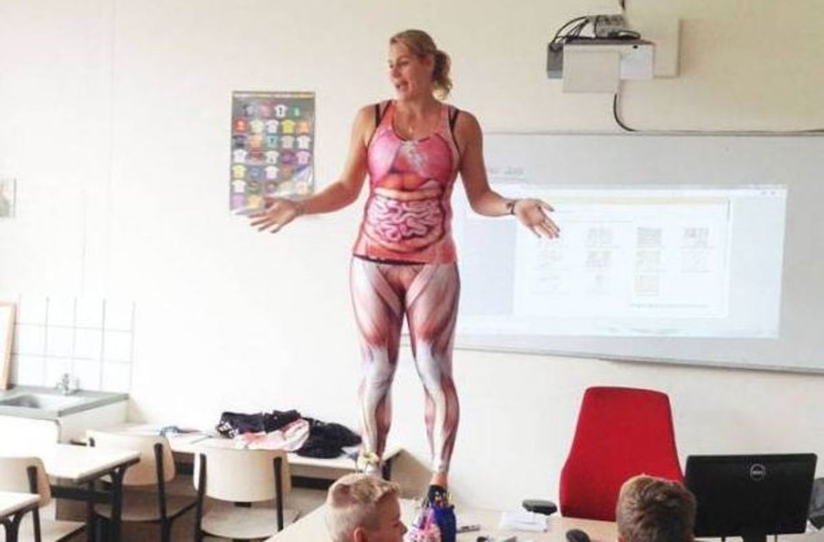 A biology teacher in the Netherlands ditched textbooks and stripped off her...