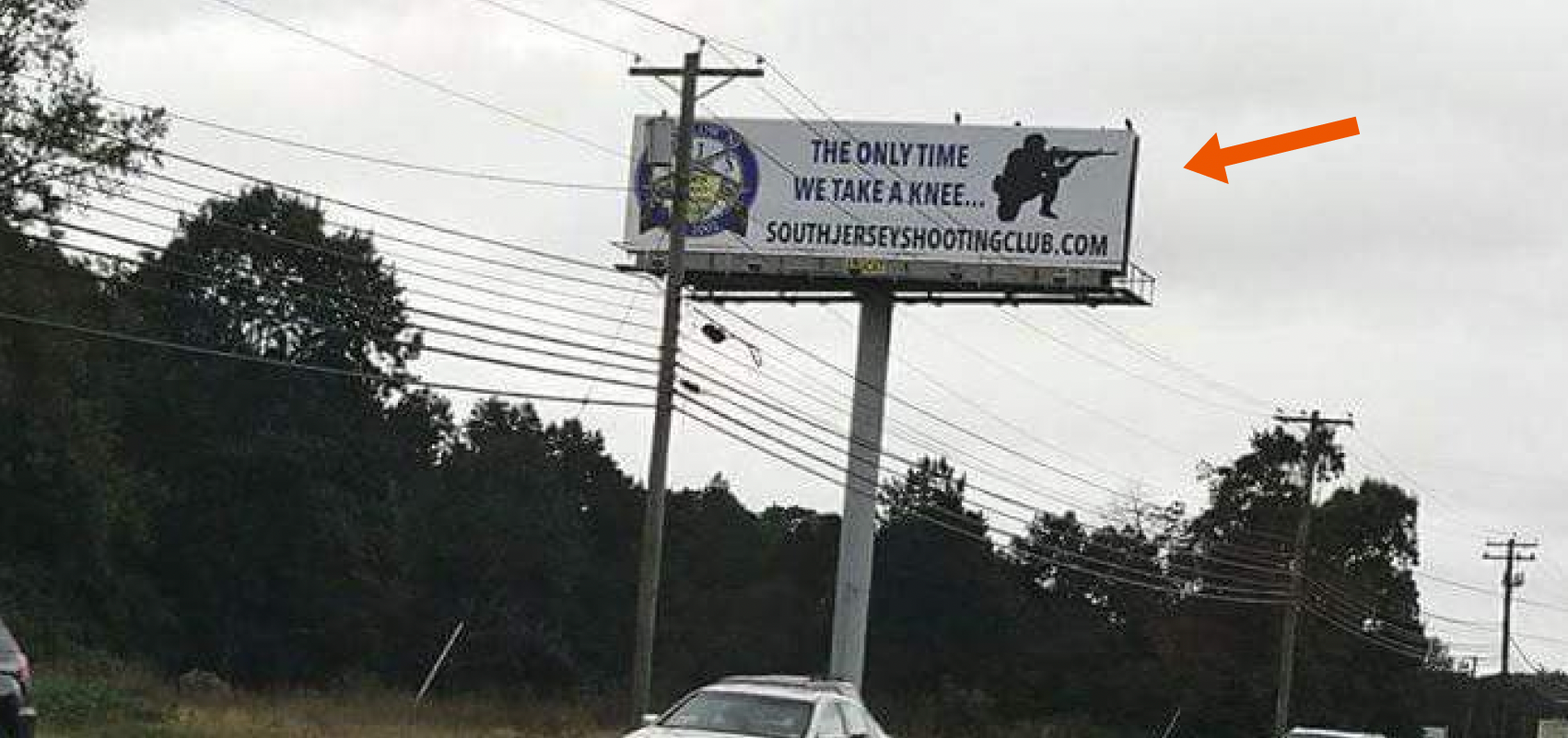 Gun Range's 'Offensive' Billboard Stirs Controversy, Owner Says He Won't Take It Down - Vimarsana News