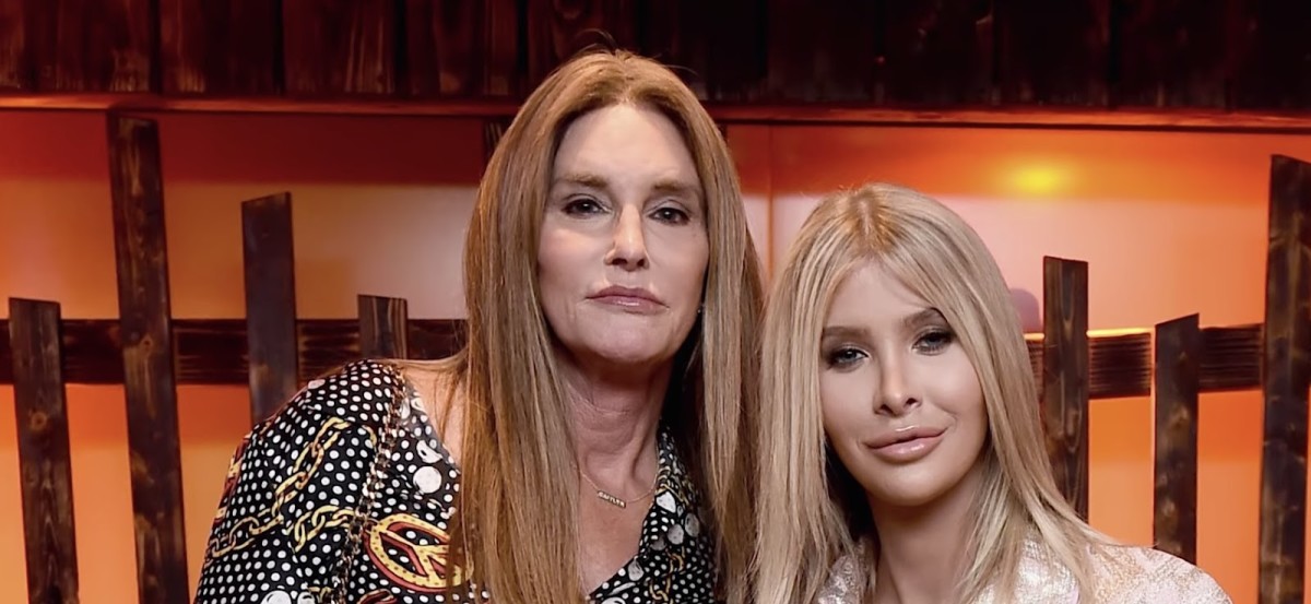 Caitlyn Jenner posing with Sophia Hutchens while standing up, Photo Credit: Nicki Swift