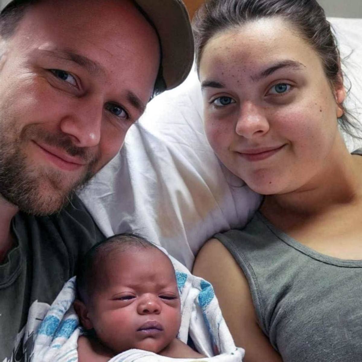 Rachel and Paul posing with their newborn boy Cash Jamal Buckman, Photo Credit: Paul Buckman/Facebook