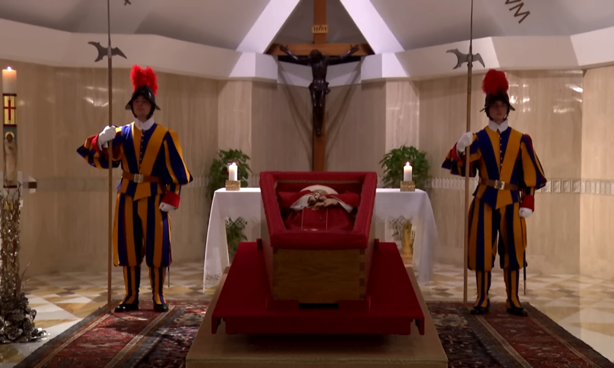 Pope Francis lying in an open coffin in the chapel of the Casa Santa Marta, Photo Credit: AFP News Agency/Youtube